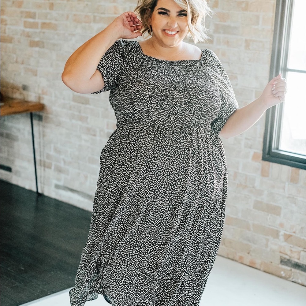 Smocked black and white dress with sleeves from Kervology